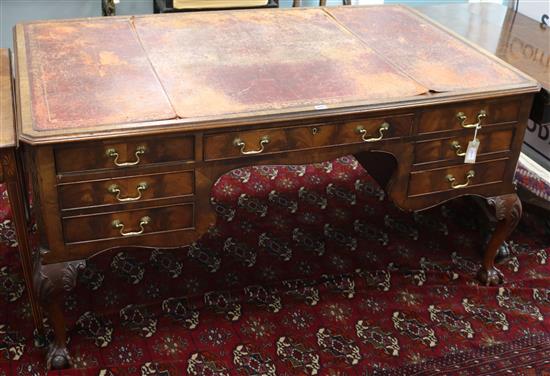 A Georgian style writing table, fitted five frieze drawers and inset leather skiver, W.150cm